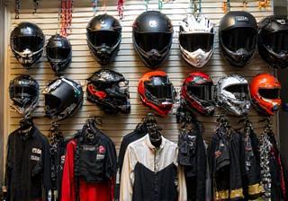 Display of motorcycle helmets, gloves, and other accessories